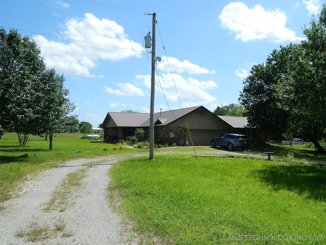 399987 W 3700th Rd, Ramona, OK 74061 - view of front facade with driveway and a front yard