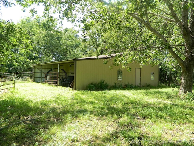 399987 W 3700th Rd, Ramona, OK 74061 - view of yard featuring a pole building and an outbuilding