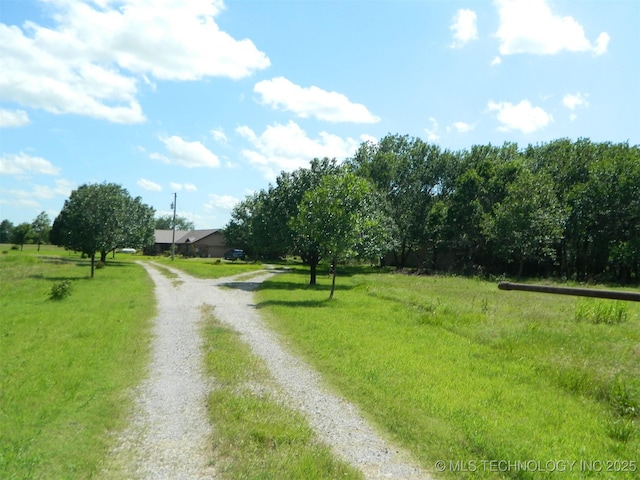 399987 W 3700th Rd, Ramona, OK 74061 - view of dirt / gravel driveway with a rural view