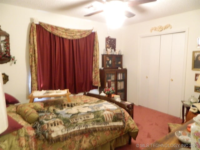 399987 W 3700th Rd, Ramona, OK 74061 - bedroom with carpet floors, a closet, and a ceiling fan