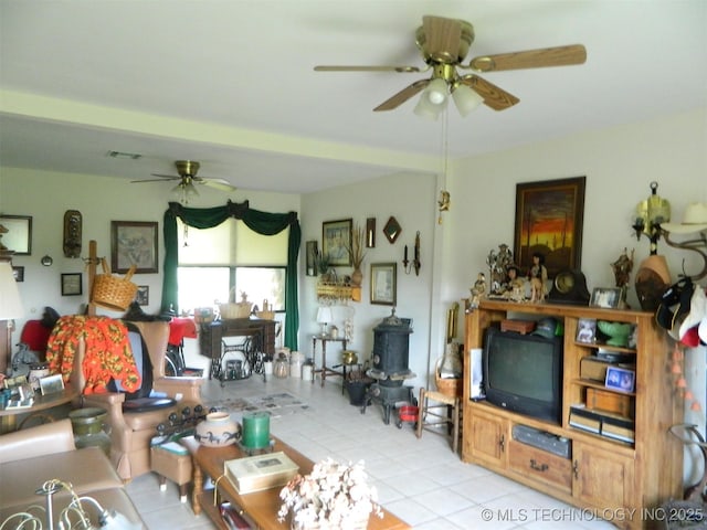 399987 W 3700th Rd, Ramona, OK 74061 - tiled living area featuring ceiling fan