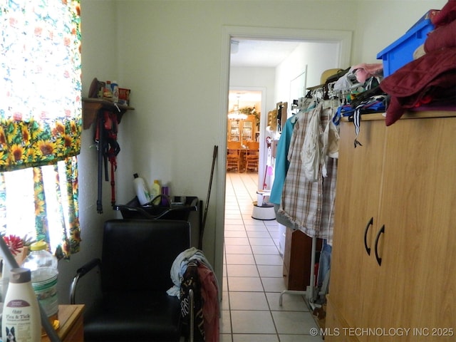 399987 W 3700th Rd, Ramona, OK 74061 - walk in closet featuring light tile patterned floors
