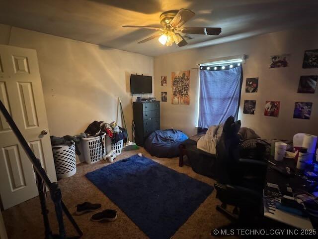 908 S Umbrella Cir, Broken Arrow, OK 74012 - carpeted bedroom with a ceiling fan