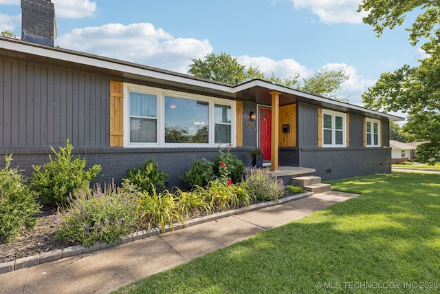 4019 E 37th St S, Tulsa, OK 74135 - view of front of house with brick siding, crawl space, a front lawn, and a chimney