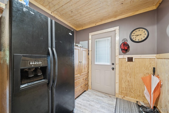 719 Oklahoma Ave, Wynona, OK 74084 - entryway with wooden ceiling and wood finished floors