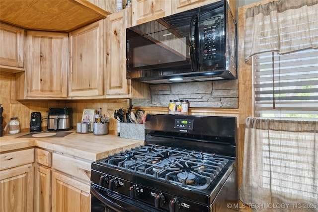 719 Oklahoma Ave, Wynona, OK 74084 - kitchen featuring black appliances, wooden counters, tasteful backsplash, and light brown cabinets