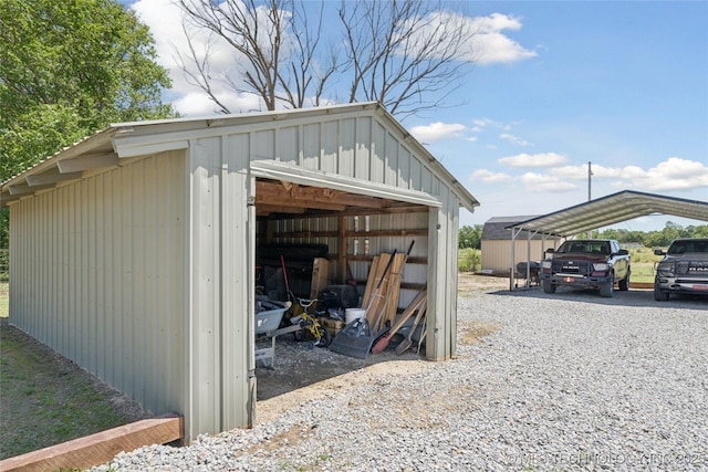 719 Oklahoma Ave, Wynona, OK 74084 - view of outbuilding with a detached carport
