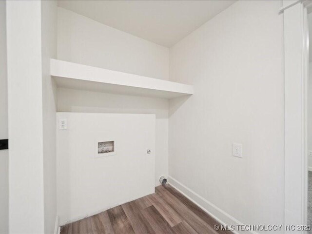409 N Cherokee St, Claremore, OK 74017 - laundry room featuring hookup for a washing machine and wood finished floors