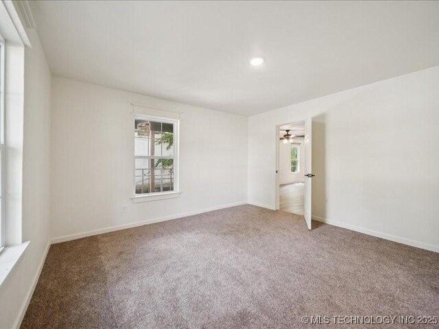409 N Cherokee St, Claremore, OK 74017 - unfurnished room featuring carpet, a ceiling fan, and recessed lighting