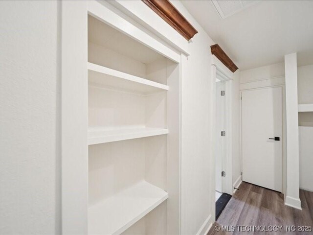 409 N Cherokee St, Claremore, OK 74017 - hall with wood finished floors