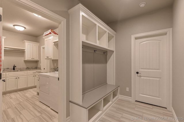 449 E 129th Pl, Jenks, OK 74037 - mudroom featuring washer and clothes dryer and baseboards