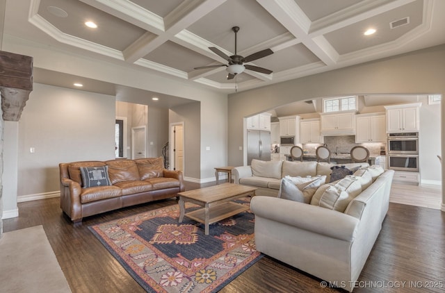 449 E 129th Pl, Jenks, OK 74037 - living room featuring a ceiling fan, coffered ceiling, beamed ceiling, arched walkways, and crown molding