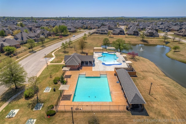 449 E 129th Pl, Jenks, OK 74037 - aerial view of residential area with a pool and a large body of water