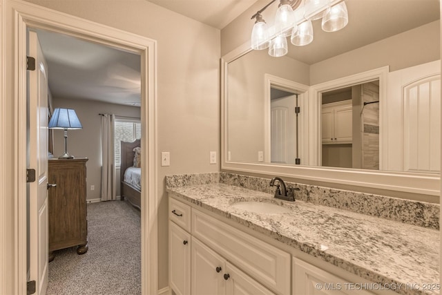 449 E 129th Pl, Jenks, OK 74037 - ensuite bathroom with vanity and baseboards
