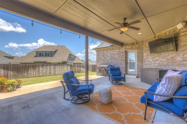 449 E 129th Pl, Jenks, OK 74037 - fenced backyard with ceiling fan, a patio area, and area for grilling