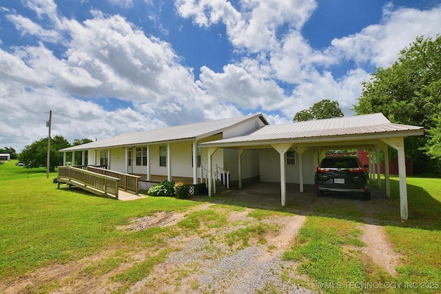16759 W Burchett Rd, Tahlequah, OK 74464 - view of front facade featuring driveway, a front lawn, covered porch, and an attached carport