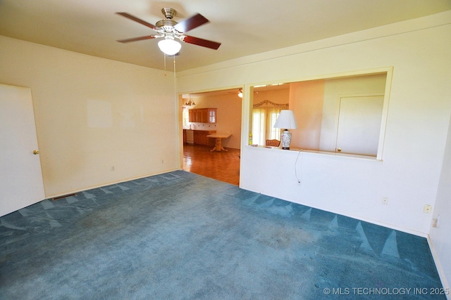 16759 W Burchett Rd, Tahlequah, OK 74464 - carpeted spare room with a ceiling fan