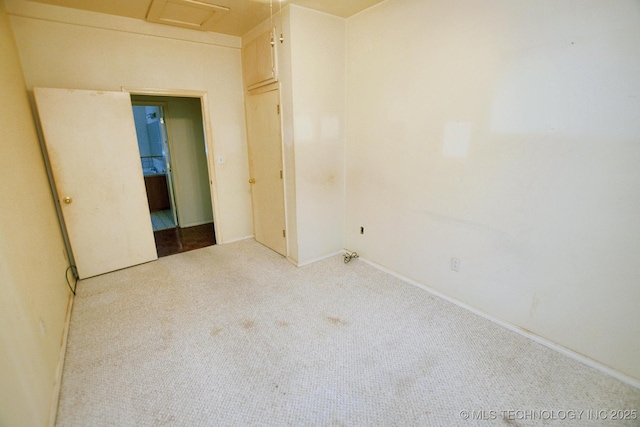 16759 W Burchett Rd, Tahlequah, OK 74464 - unfurnished bedroom featuring carpet and attic access