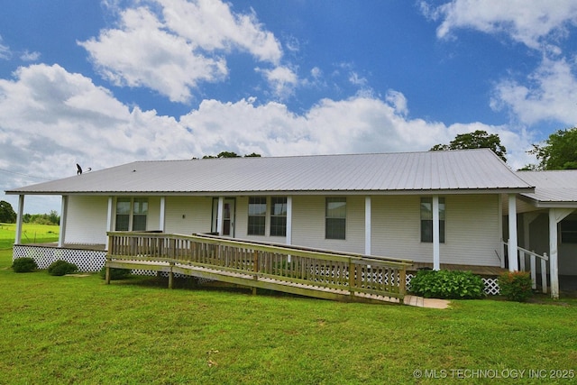 16759 W Burchett Rd, Tahlequah, OK 74464 - back of house featuring a metal roof and a yard