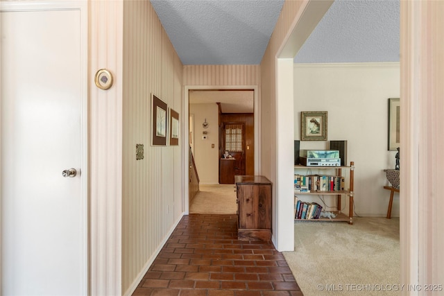 7033 E 99th St, Tulsa, OK 74133 - hallway featuring a textured ceiling
