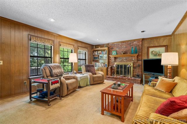 7033 E 99th St, Tulsa, OK 74133 - living area featuring wood walls, a textured ceiling, carpet floors, a fireplace, and crown molding