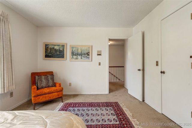 7033 E 99th St, Tulsa, OK 74133 - carpeted bedroom featuring a textured ceiling