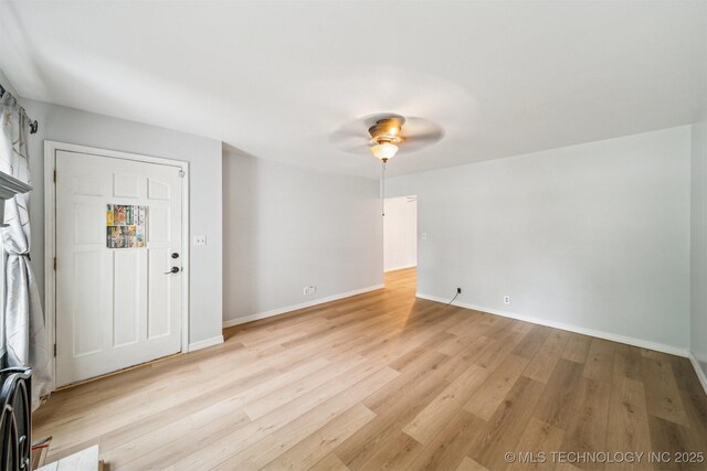 4262 E 24th Pl, Tulsa, OK 74114 - entrance foyer featuring light wood-type flooring and a ceiling fan