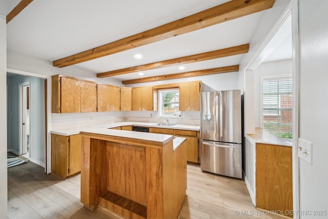 4262 E 24th Pl, Tulsa, OK 74114 - kitchen featuring stainless steel refrigerator with ice dispenser, light wood-style floors, light countertops, recessed lighting, and beamed ceiling