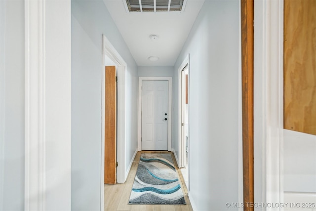 4262 E 24th Pl, Tulsa, OK 74114 - corridor featuring light wood-style flooring and baseboards