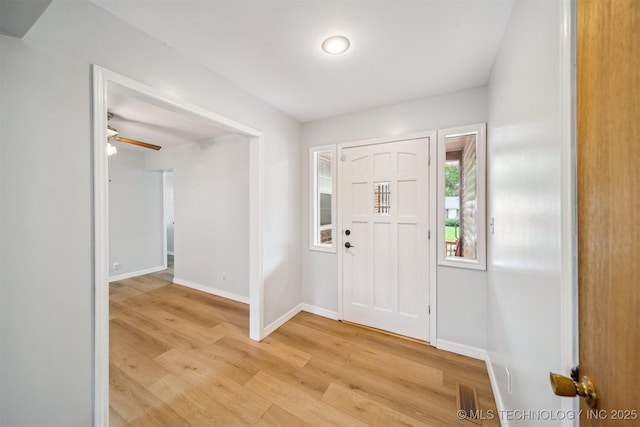 4262 E 24th Pl, Tulsa, OK 74114 - entrance foyer featuring light wood finished floors and baseboards