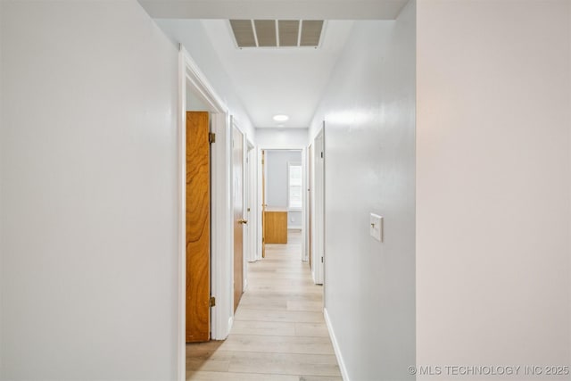 4262 E 24th Pl, Tulsa, OK 74114 - corridor with light wood finished floors and baseboards