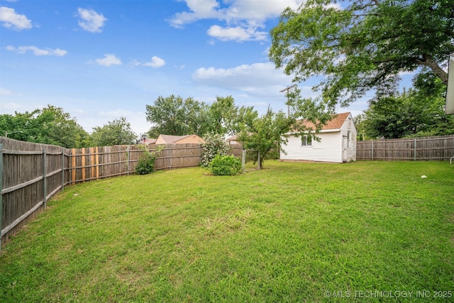4262 E 24th Pl, Tulsa, OK 74114 - fenced backyard featuring an outdoor structure