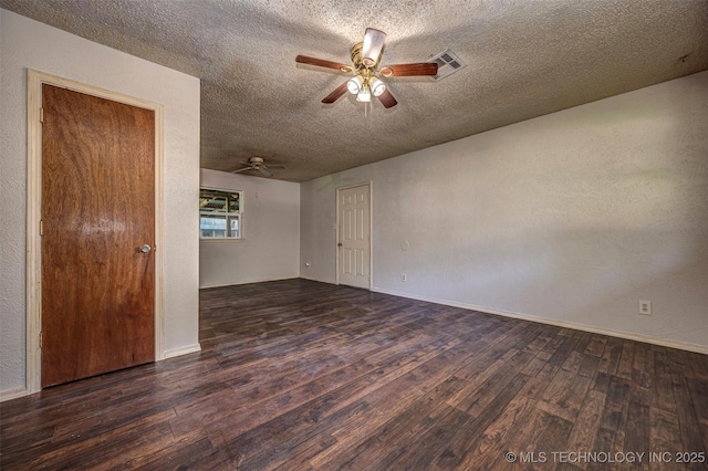 807 E Tahlequah, Sulphur, OK 73086 - spare room featuring wood finished floors, ceiling fan, and a textured ceiling