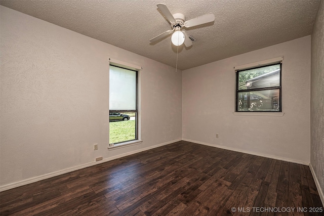 807 E Tahlequah, Sulphur, OK 73086 - spare room featuring wood finished floors, a textured ceiling, and ceiling fan