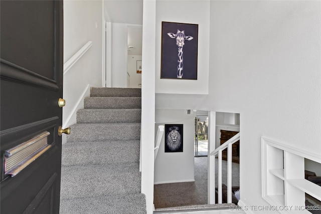 4814 E 68th St Unit 106, Tulsa, OK 74136 - stairway featuring carpet flooring