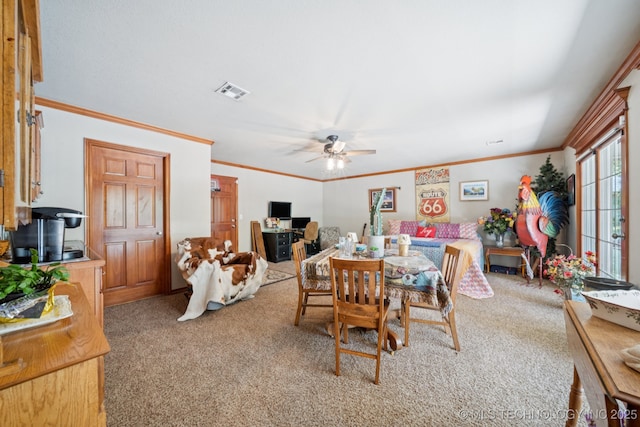 25070 S Red Oak Dr, Claremore, OK 74019 - carpeted dining area featuring ornamental molding and a ceiling fan