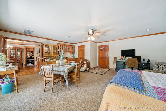 25070 S Red Oak Dr, Claremore, OK 74019 - dining area featuring carpet floors, ornamental molding, and a ceiling fan