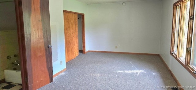 514 W Wichita Ave, Cleveland, OK 74020 - unfurnished bedroom featuring baseboards