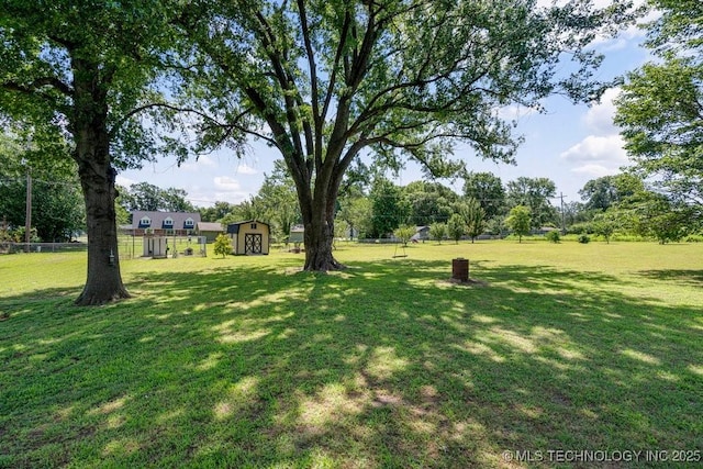 12915 S 120th E Pl, Tulsa, OK 74011 - view of yard featuring a storage shed