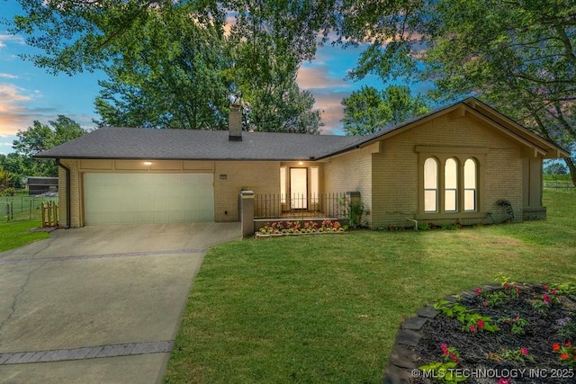 12915 S 120th E Pl, Tulsa, OK 74011 - single story home with brick siding, a garage, driveway, and a chimney
