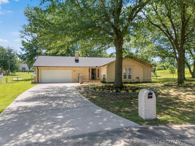 12915 S 120th E Pl, Tulsa, OK 74011 - single story home featuring concrete driveway, a garage, and a chimney