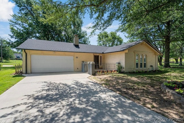 12915 S 120th E Pl, Tulsa, OK 74011 - view of front of house featuring brick siding, an attached garage, driveway, and a chimney