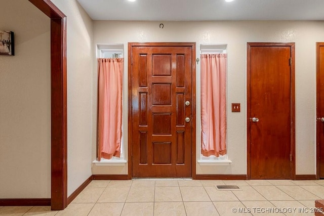 12915 S 120th E Pl, Tulsa, OK 74011 - foyer entrance with light tile patterned floors and recessed lighting