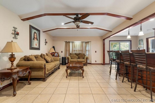 12915 S 120th E Pl, Tulsa, OK 74011 - living room with ceiling fan, light tile patterned flooring, lofted ceiling, and a bar