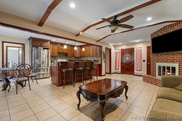 12915 S 120th E Pl, Tulsa, OK 74011 - living area with light tile patterned floors, a ceiling fan, recessed lighting, and a brick fireplace