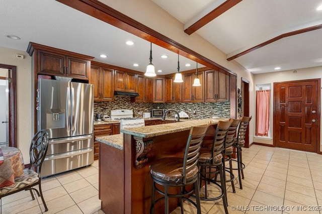 12915 S 120th E Pl, Tulsa, OK 74011 - kitchen with stainless steel fridge with ice dispenser, gas range gas stove, decorative backsplash, under cabinet range hood, and recessed lighting