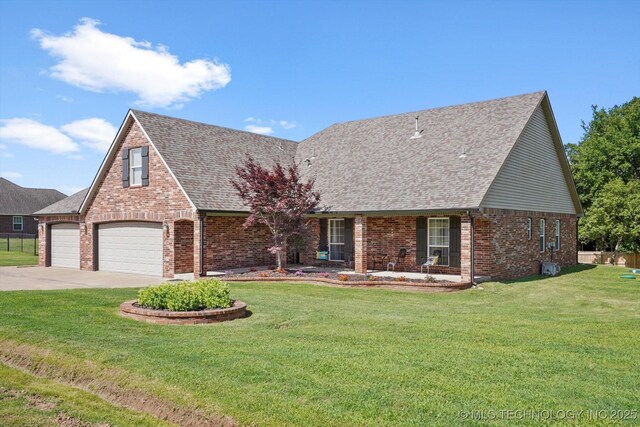 13718 S 262nd E Ave, Coweta, OK 74429 - view of front of home with brick siding, roof with shingles, and concrete driveway
