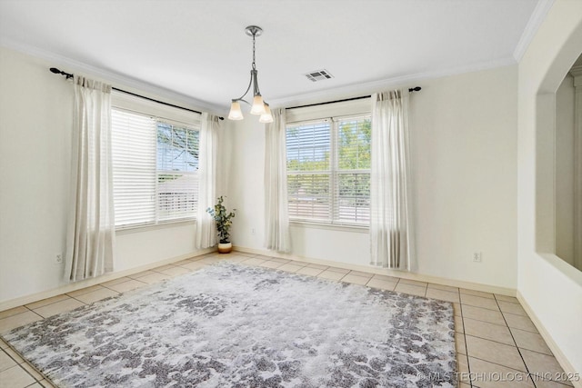 13718 S 262nd E Ave, Coweta, OK 74429 - unfurnished room with tile patterned flooring, crown molding, and arched walkways