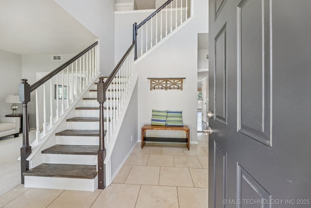 200 N Redwood Ct, Broken Arrow, OK 74012 - tiled foyer with a towering ceiling and stairway