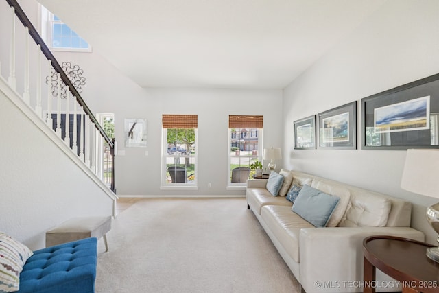 200 N Redwood Ct, Broken Arrow, OK 74012 - living area featuring light colored carpet and stairs